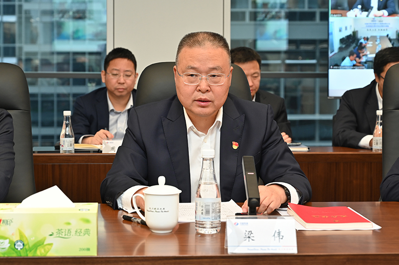 2.梁偉.JPG